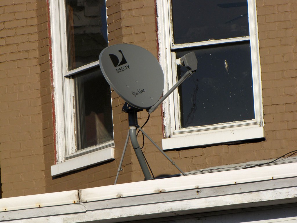 Satellite dish on roof of home A DirecTV satellite dish on… Flickr