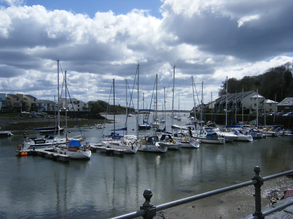 Boats moored in the river at Porthmadog. This part of the … Flickr
