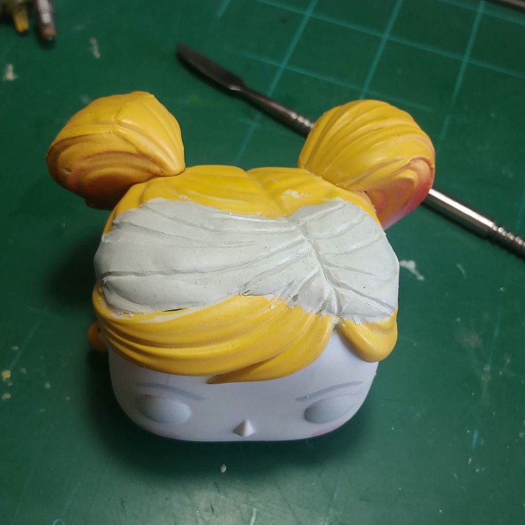 Trying my first Pop Vinyl custom. Sculpting Harleys hair b… Flickr