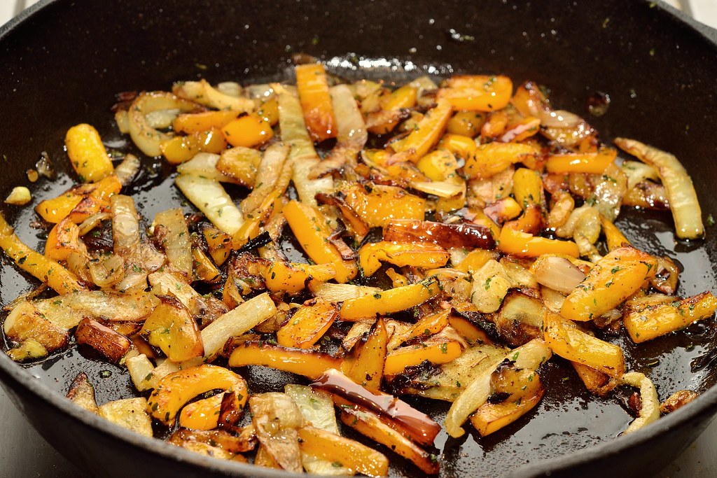 Yellow Bell Peppers Sauteed In A Cast Iron Pan Yellow Bell… Flickr