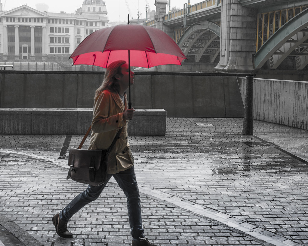 Red umbrella Raining by London Bridge keith ellwood Flickr