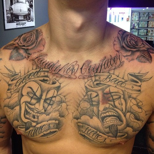 just added shoulder roses and script to this chest piece..… Flickr