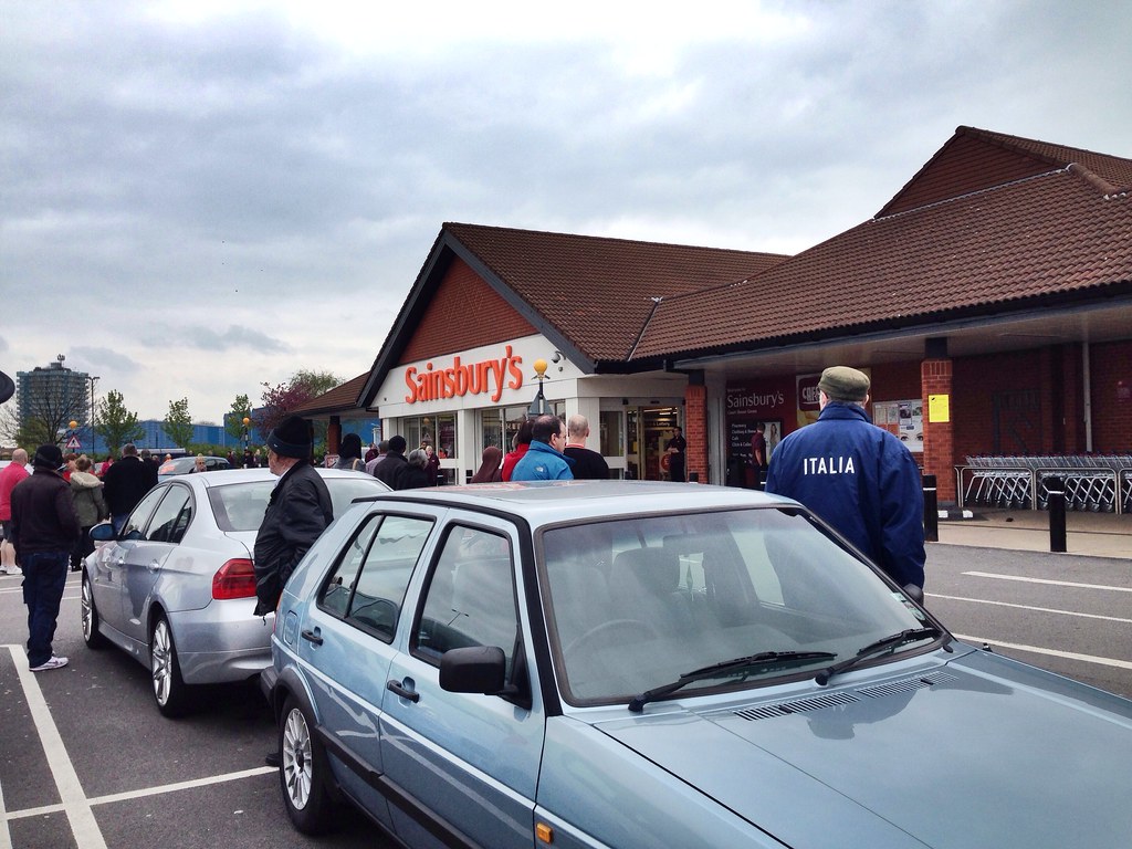 Fire alarm at Sainsbury's Customers wait to be allowed bac… Flickr