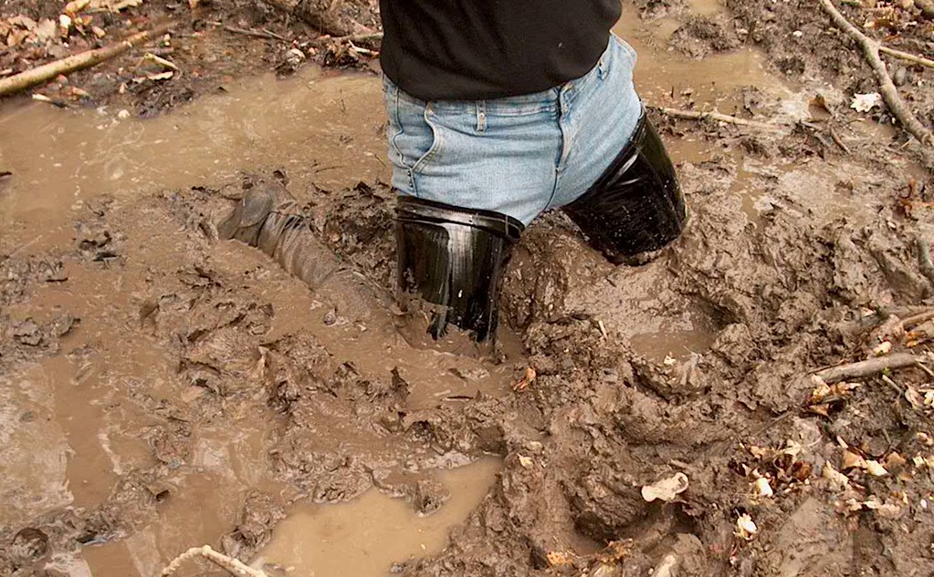 IM001701 a wet walk in black thigh high boots hymerwaders Flickr