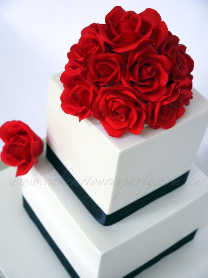 Red fondant roses for wedding cake www.cakemetoyourparty.c… Flickr
