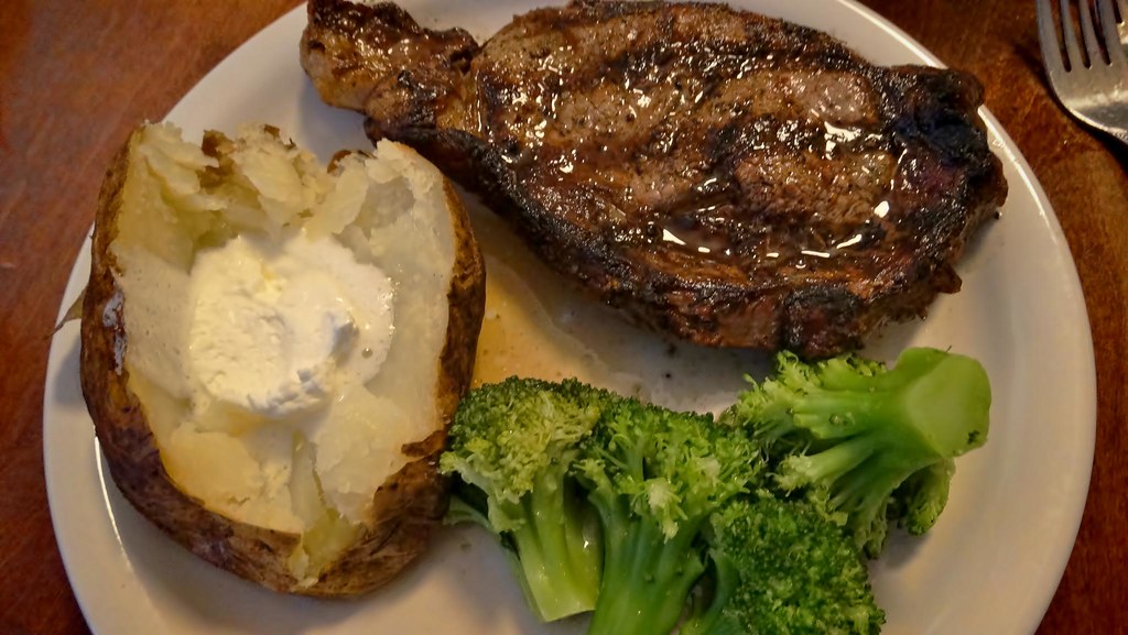 Ribeye Steak, baked potato, buttered broccoli DSC05873 Flickr