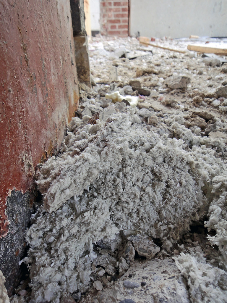Asbestos Debris at Construction Site Example of asbestos d… Flickr