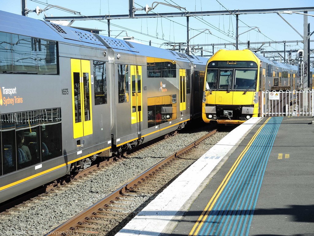 Sydney Trains Waratah Sets A75 and A32 cross at Redfern Flickr