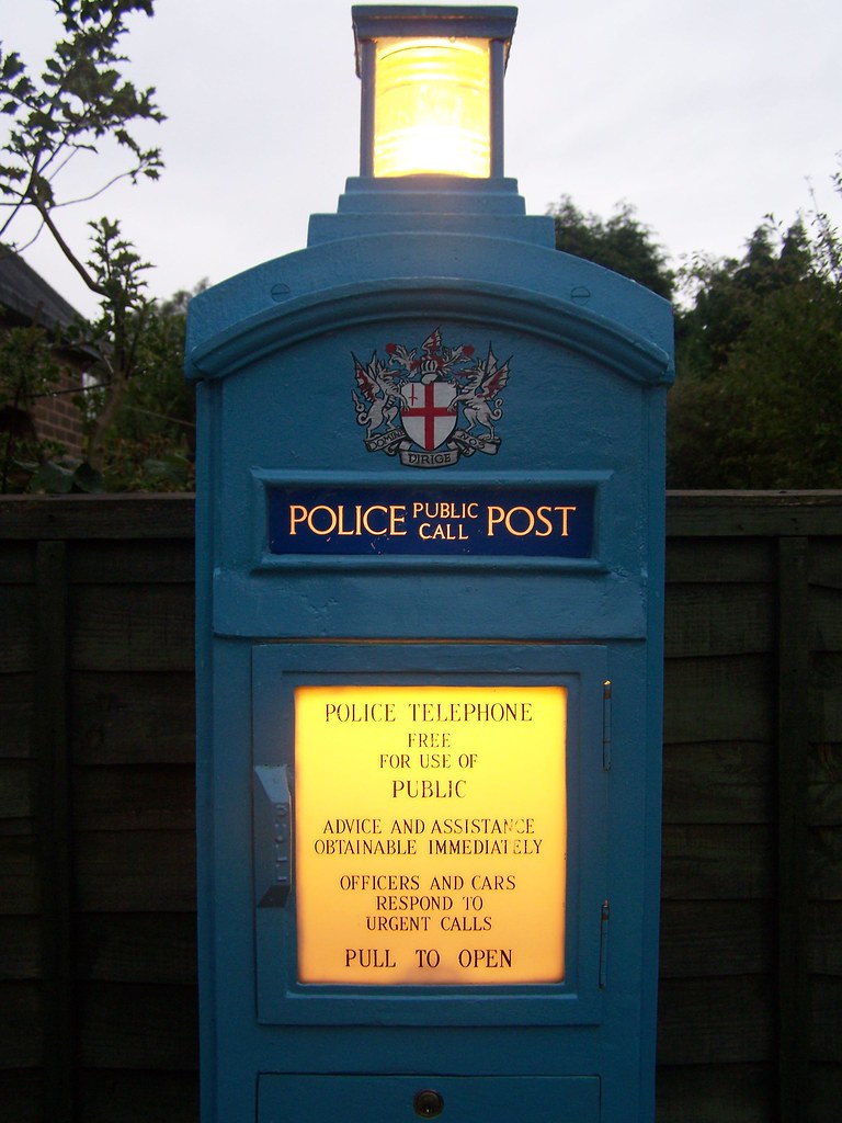 Police public call post at night close up with call lamp f… Flickr