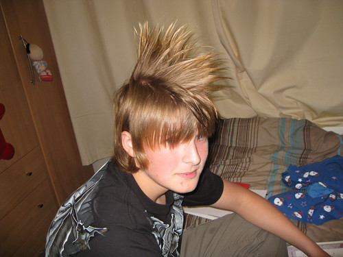 My brother let me play with his hair... it's getting so lo… Flickr