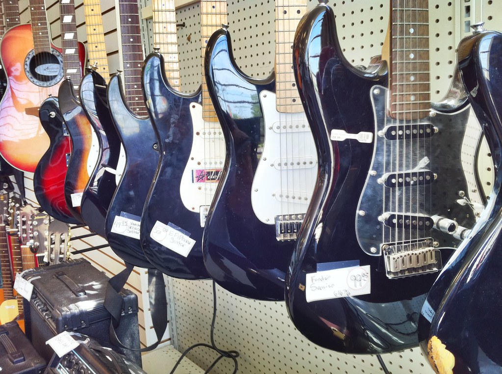 Guitars in an OKC Pawn Shop Wesley Fryer Flickr