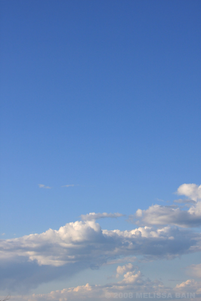 Blue sky & clouds vertical Vertical image of a clear blu… Flickr