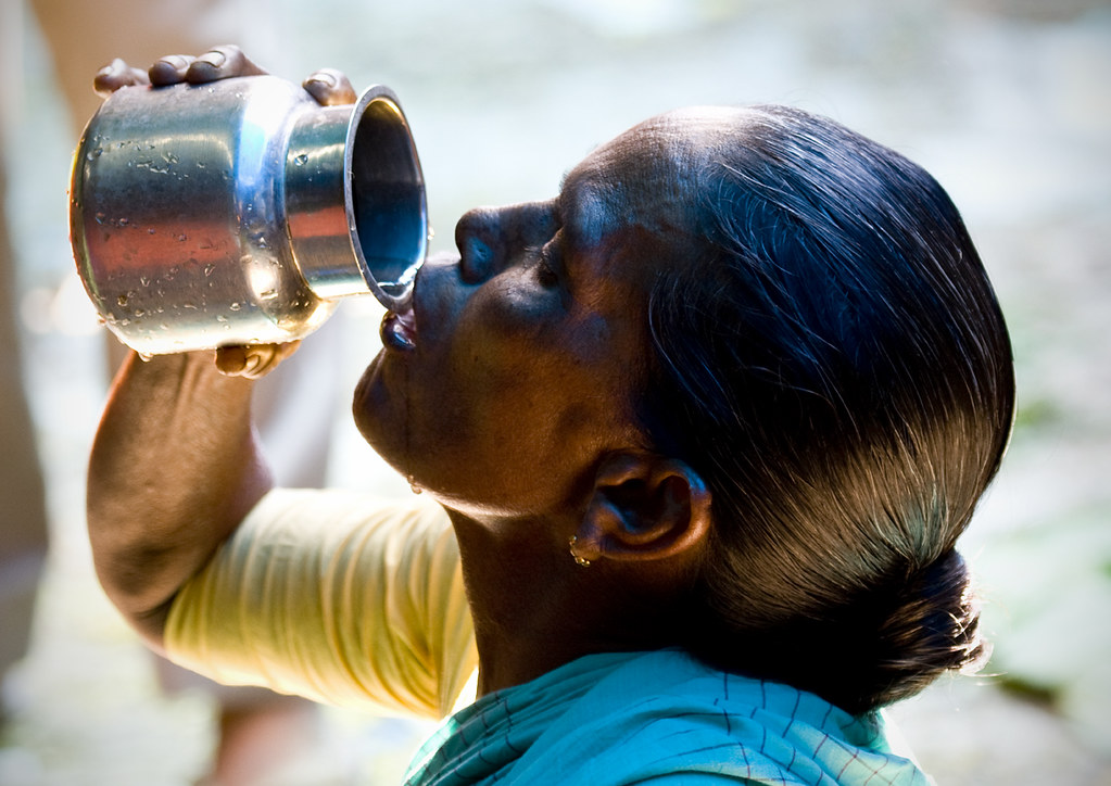 Thirsty woman drinking water India South India Tamil nad… Flickr
