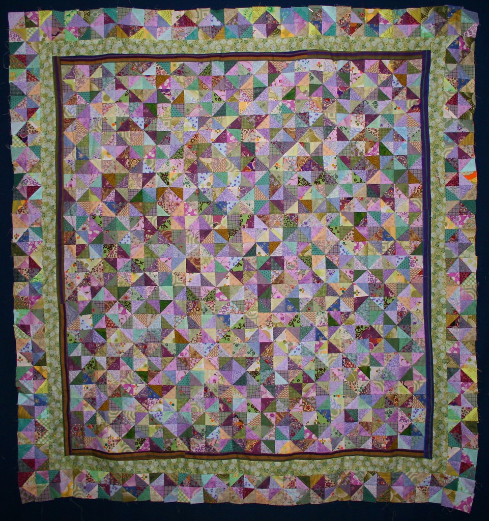 Scrappy quilt Finally got around to putting a border on th… Flickr