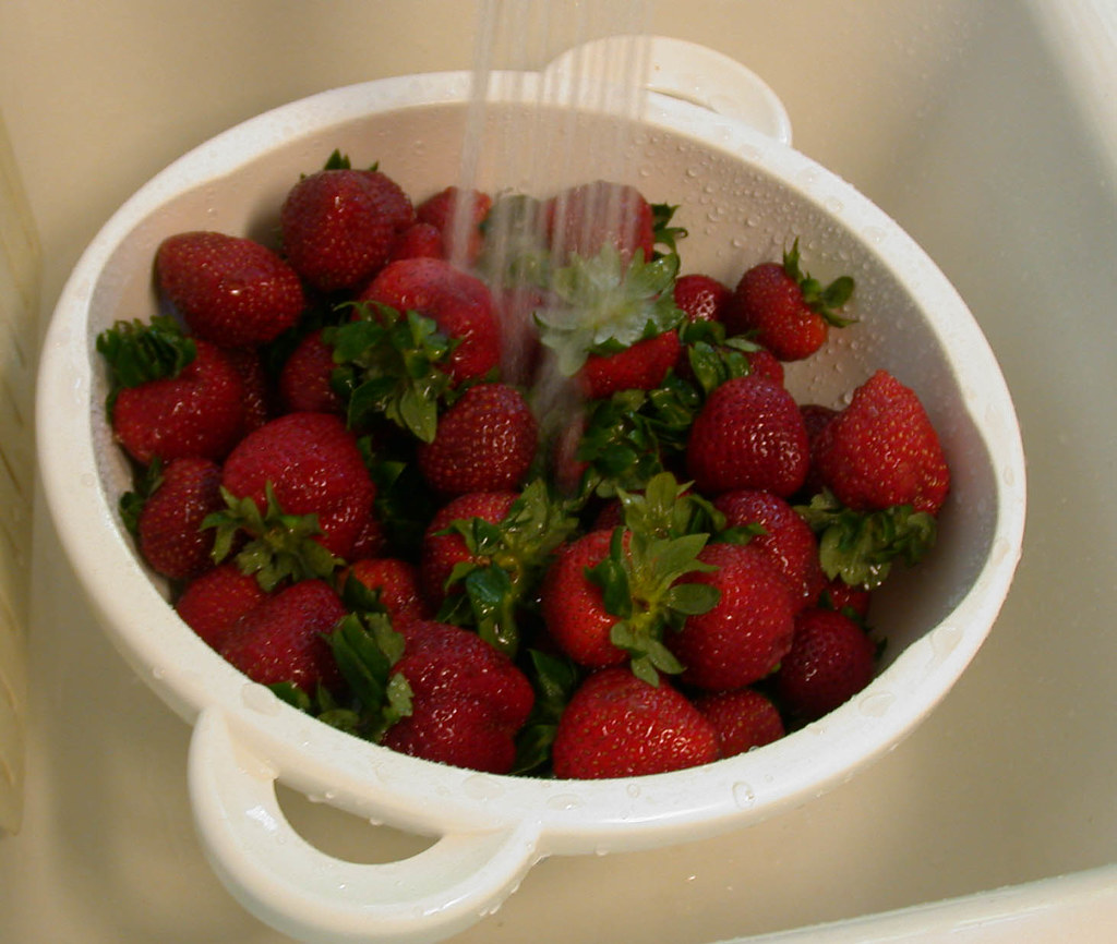 Strawberry jam 1 Rinsing strawberries in preparation for m??? Flickr