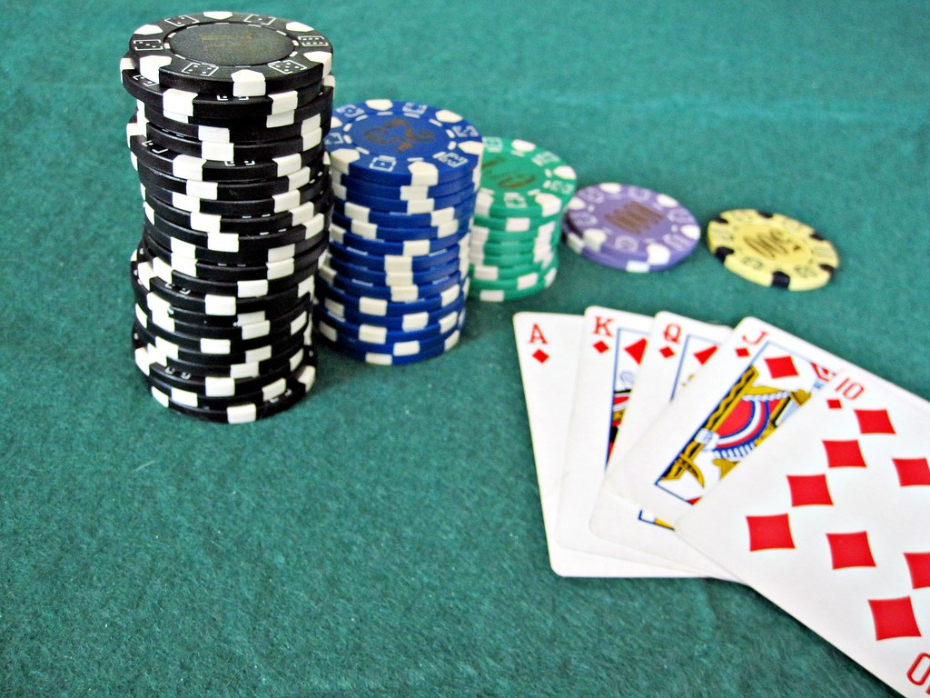Poker hand and Chips A winning poker hand with a pile of c… Flickr