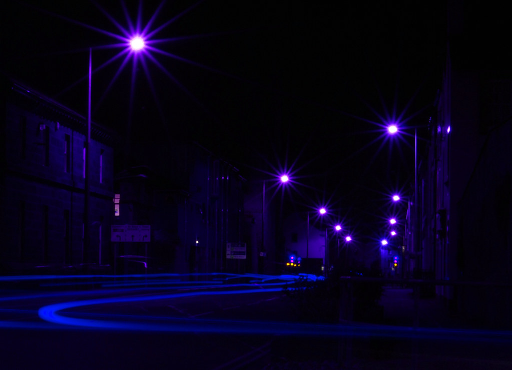 dark blue street lights and traffic trails hue adjusted … Flickr
