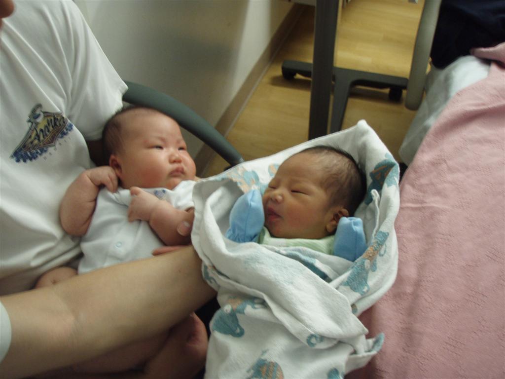 Daddy's left side baby Chloe right side baby Collin Mr. Chau