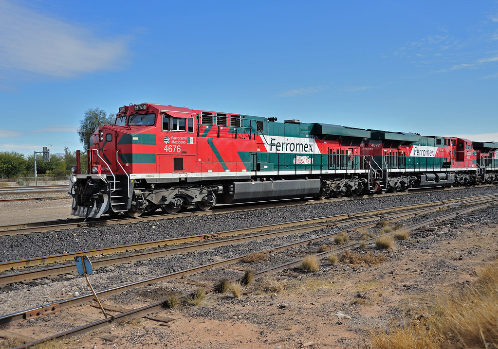 Ferromex 4676 and 4677 lead a southbound freight from Tucson's Union