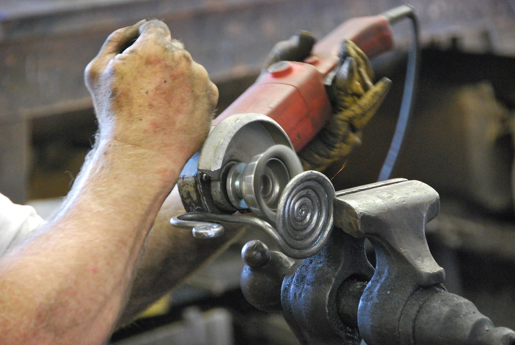 Polishing metal in the Neil Staeck Flickr