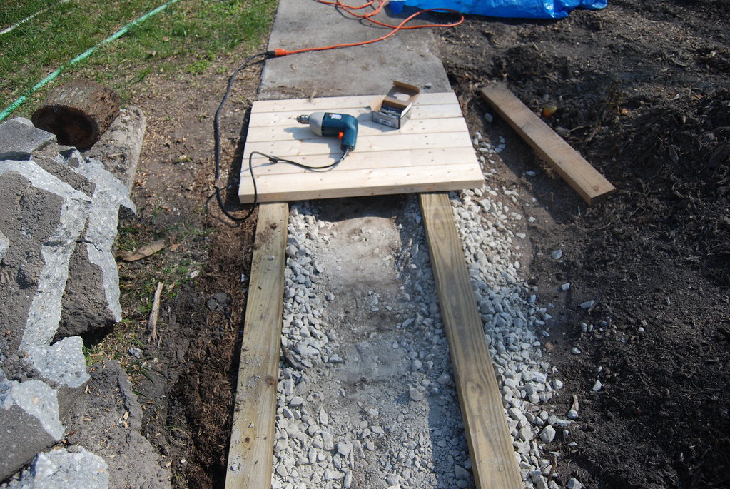 wooden sidewalkstep3 Have Lowes cut the 2x4's into 30in… Flickr