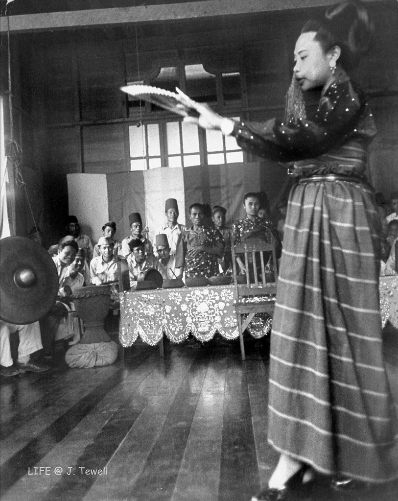 A Moro dancing girl doing fan dance, Southern Philippines 1949 (3) a