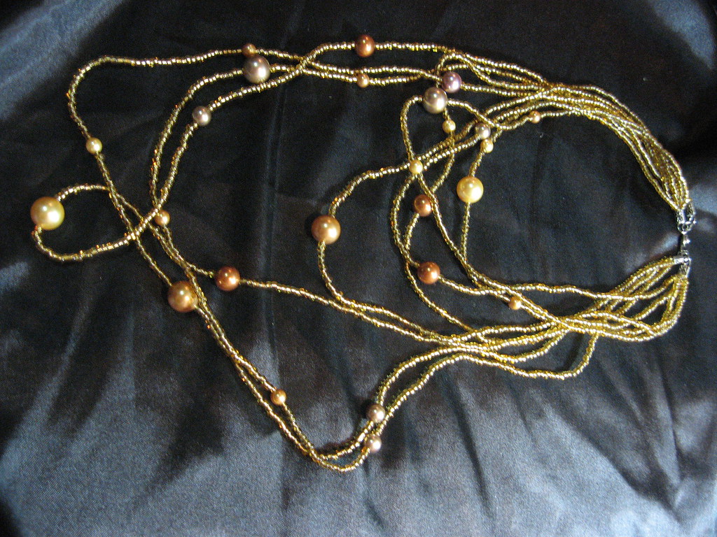 Shimmering Sensation Faux gold beads with faux pearls in v… Flickr