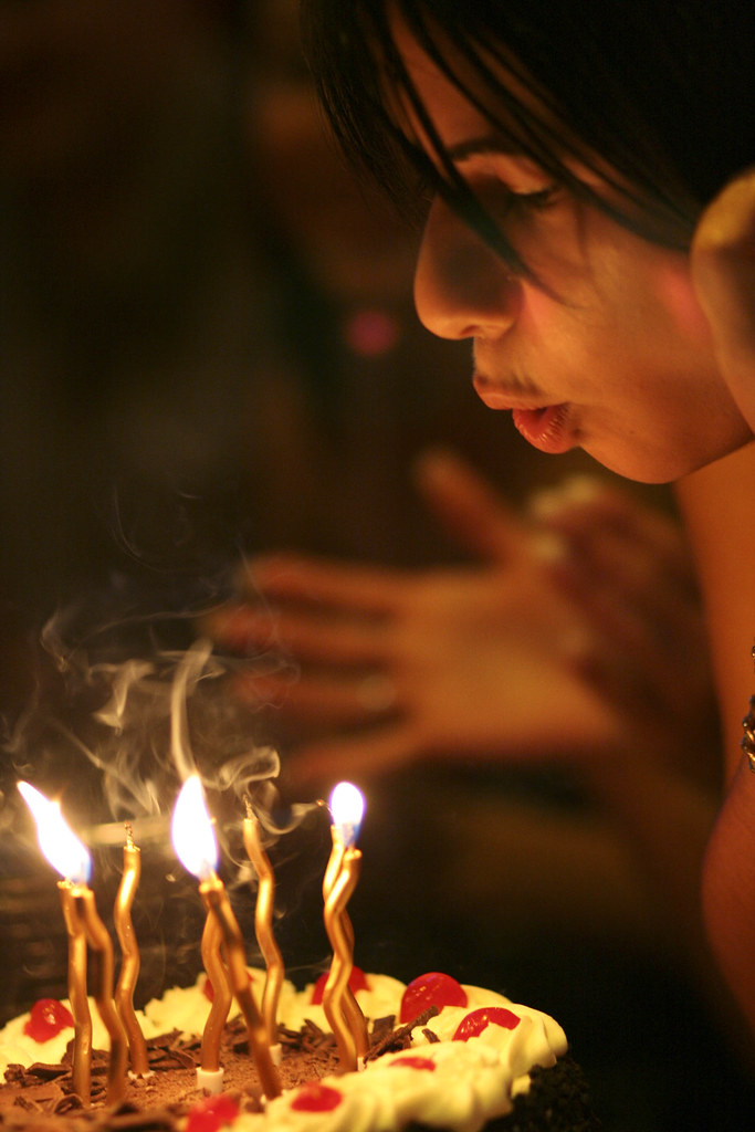 Blowin out the candles 1 My Niece blowin' out hte candles … Flickr