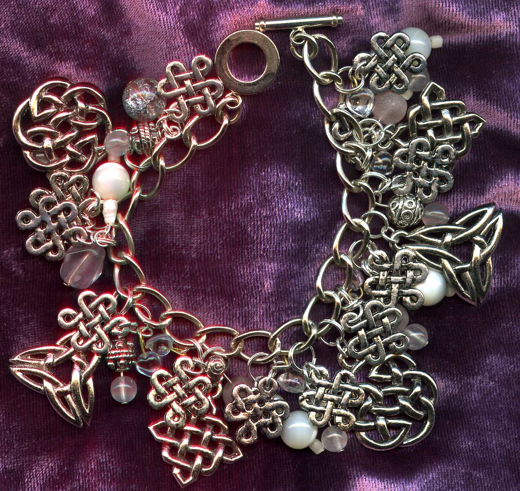 Celtic Rose Celtic knots and rose quartz. polana.fehu Flickr