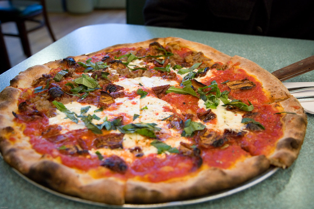 Nick's Pizza Sausage and sun dried tomatoes. Not as good a… Flickr