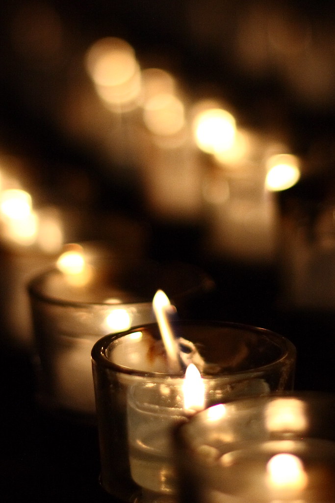 Votive candles Washington National Cathedral. Kari Nesler Flickr