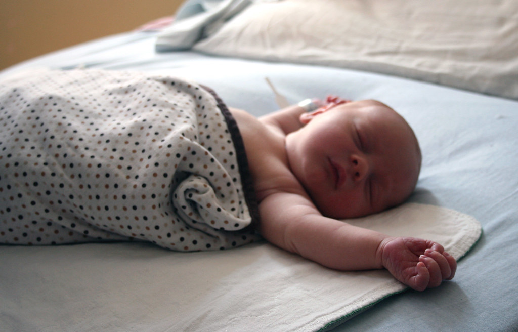 Lessons in swaddling Taken at a day old, my first attempt … Flickr