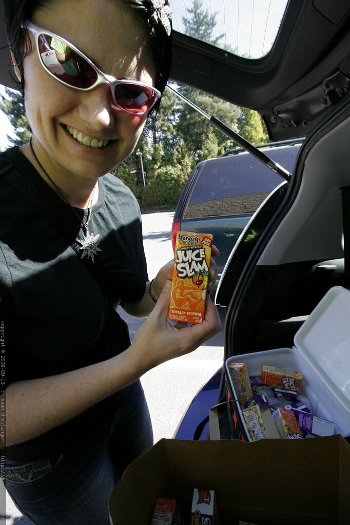 soccer mom, filling up a cooler full of juice boxes for th… Flickr