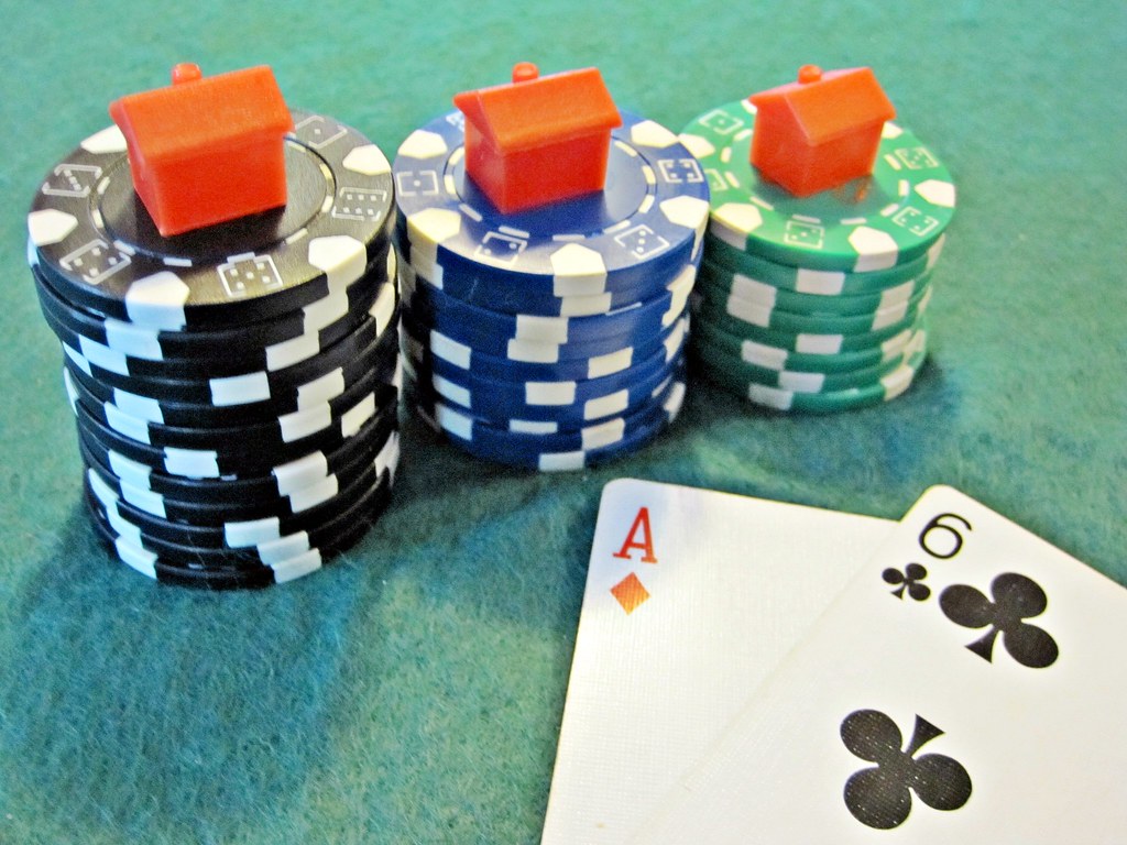 Casino Chips with houses on top Three piles of casino chip… Flickr