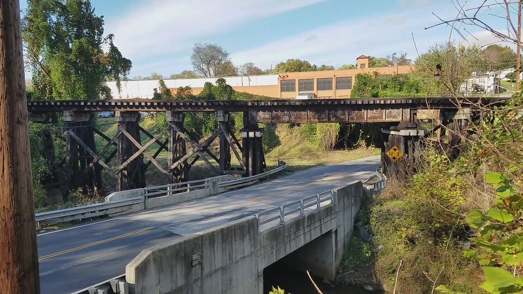 NS train crossing railroad bridge over Florida Avenue in L… Flickr