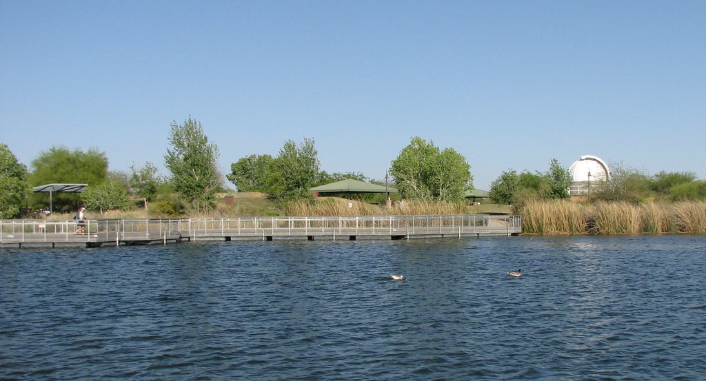 View from the urban fishing pond Across the water you can … Flickr