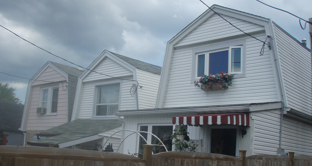 Storm and Three Barn Like Houses memorial park drive Anthony Easton