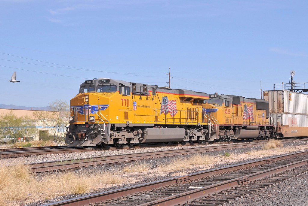 Union Pacific 7711 and 4528, entering Tucson, Arizona, with