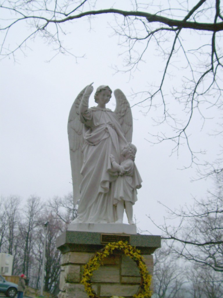 Guardian Angel Guardian Angel statue the Lourdes Grotto,… Flickr