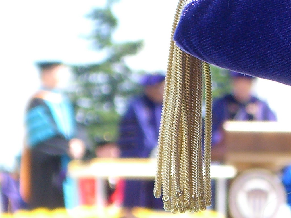 tassel UW commencement 2008. On stage, left to right Univ… Flickr