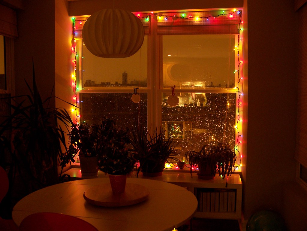 Let the Christmas lights begin And on a snowy evening. Flickr