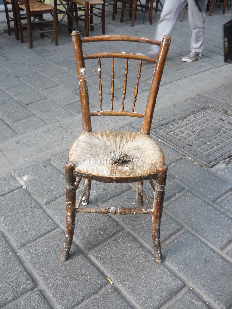 thrown away chair Campana in Athens Flickr