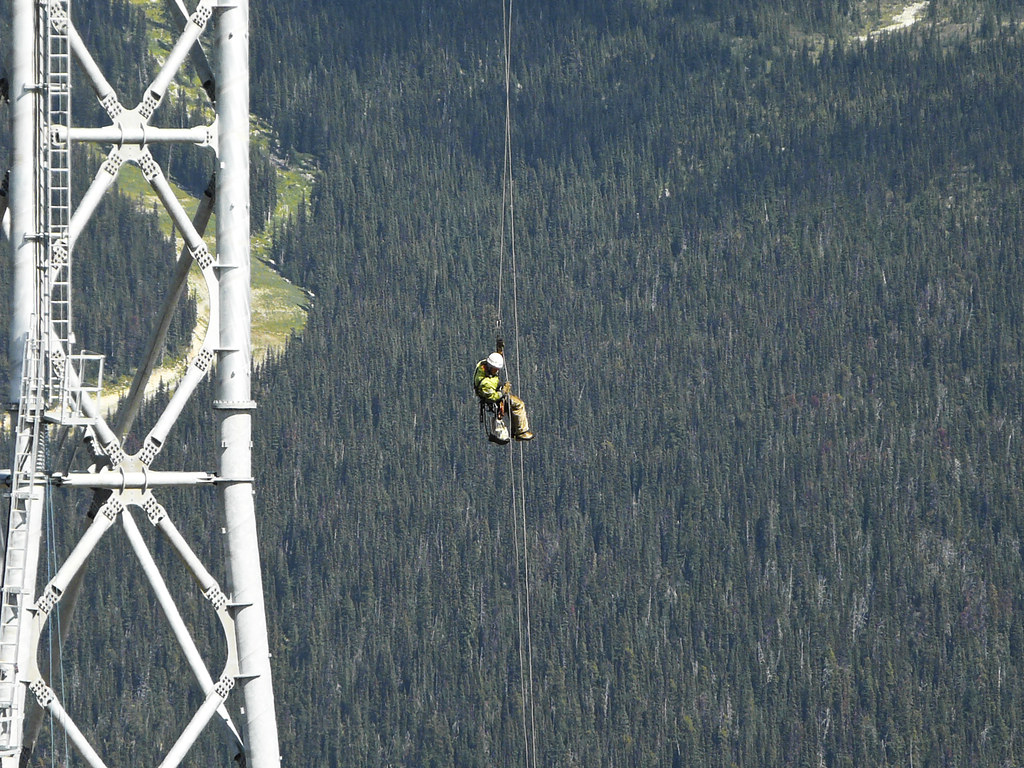 Exciting Jobs Workers working on the big gondola line betw… Flickr