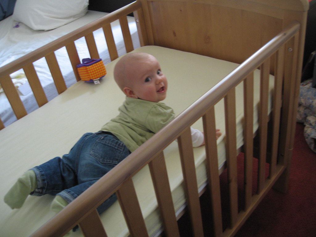 NewCotBed1 Caitlyn, giving her new cot bed (crib) a test d… Flickr