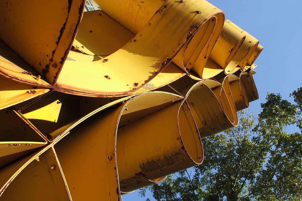 Yellow metal sculpture in front of the Art Museum of the … Flickr