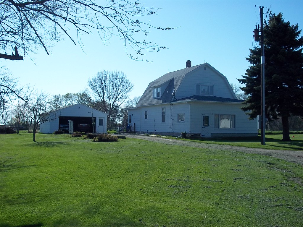 100_0499 Outside view of home and detached garage. Wheatland, ND