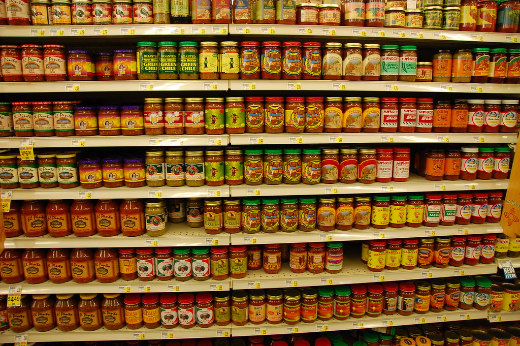 A wall of chili sauces this is an aisle in a grocery store… Flickr