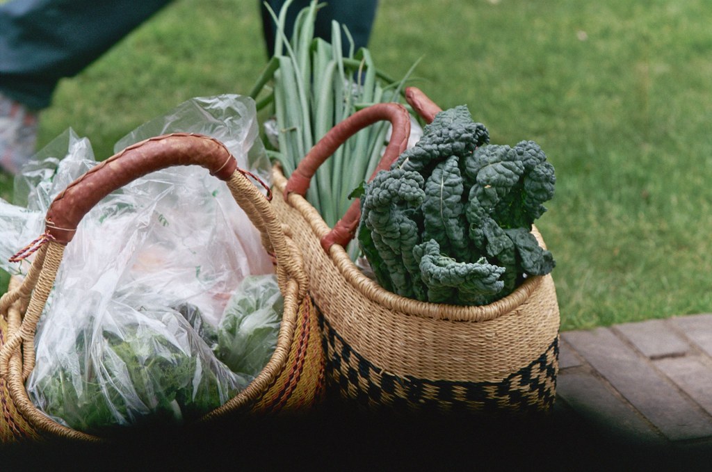 produce in farmer's market baskets, april it kind of defea… Flickr