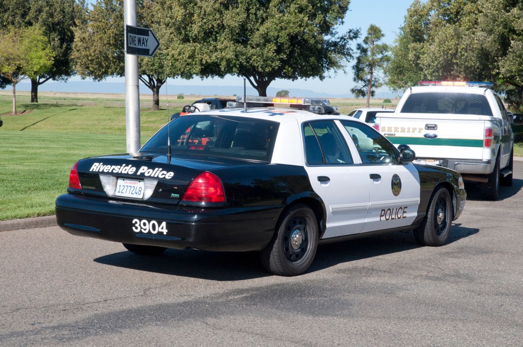 Riverside Police Back Code 3 A Riverside police officer in… Flickr