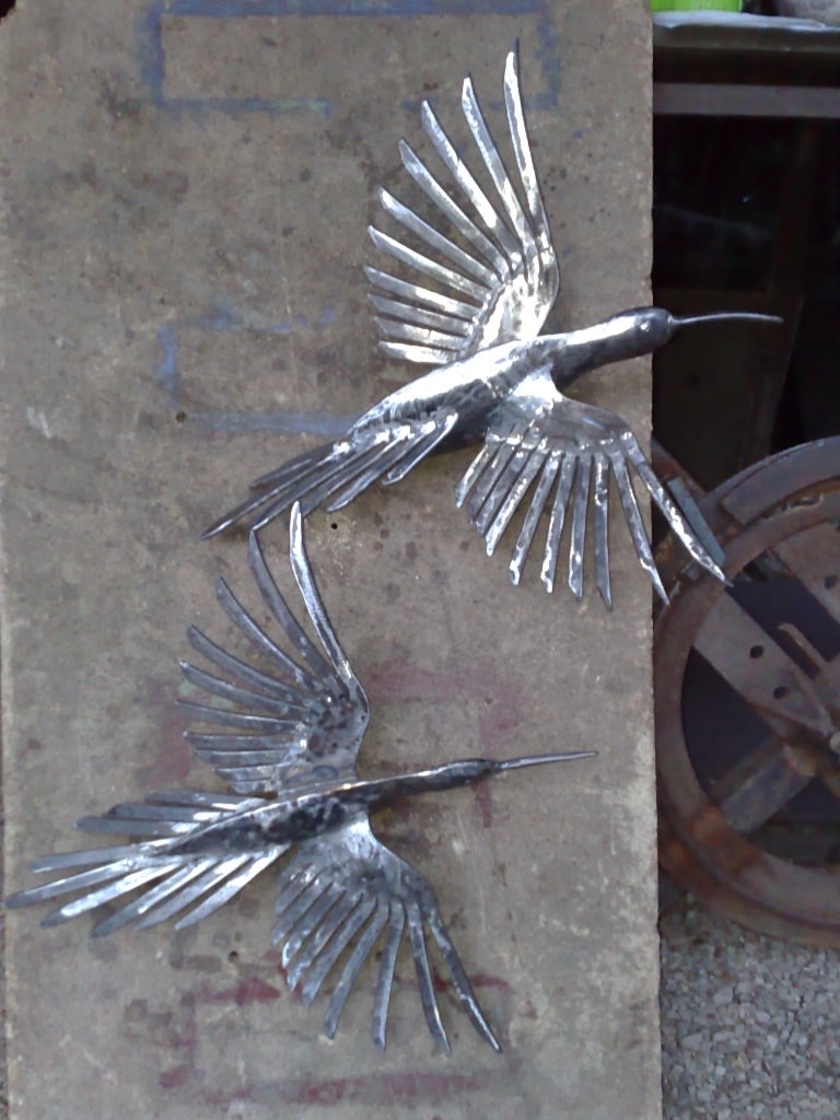 Garden art metal birds Garden art metal birds. Flickr